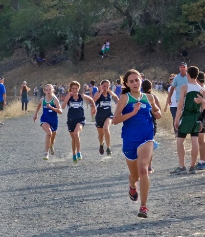 Grace Dailey (B) finishes first at Bon Tempe with Juliette Nast (JS), Hannah Chau (JS) and Callie Jones (B) battling for second.
